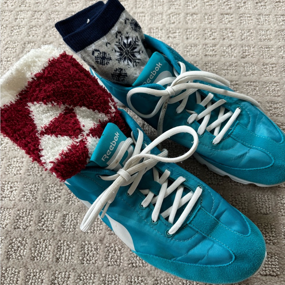Reebok women’s sneakers. Gently worn. Good condition. Two pair new socks.